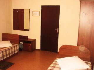 Отель Corona Hotel Караганда Кровать в общем номере с 4 кроватями-2